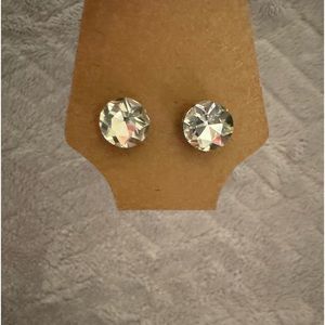 Silver with clear stone